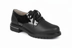Scarpa stringata Elite Tomasi Store Greta in vernice nera con suola carrarmato e finitura testurizzata